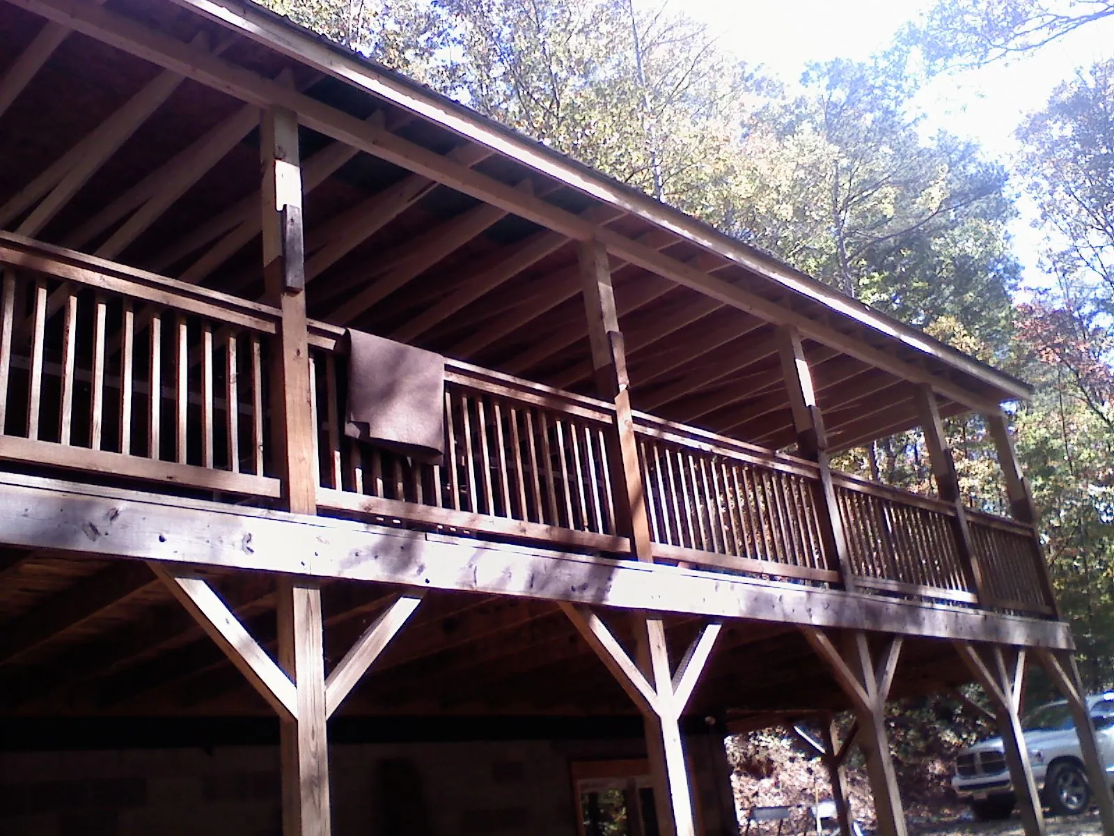 Timber framing under a new elevated porch and deck — Roof Leak Repair in Waterford by Roofing Brothers